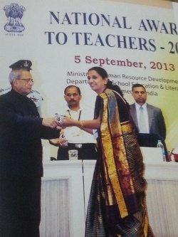 File:Radha receiving award from President of India 5XvWui.jpg