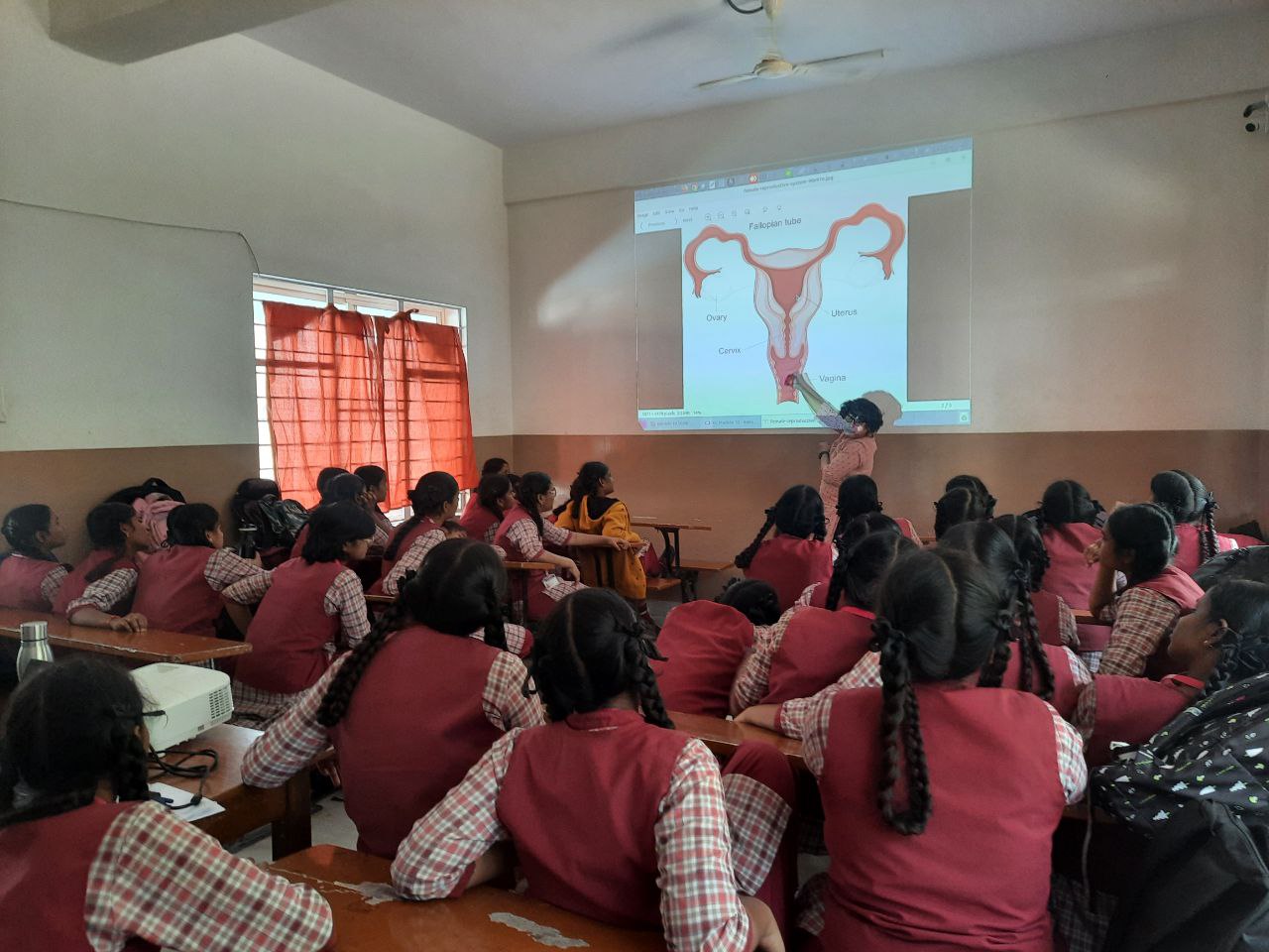 Girls learn about the female reproductive system in a Kishori Lab in Bengaluru, India